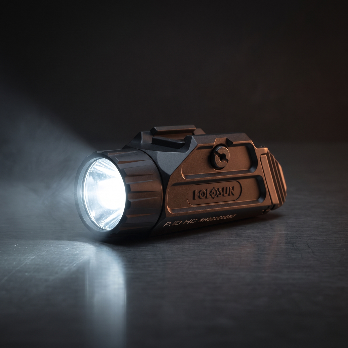 Holosun P.ID HC high-candela weapon light throwing a tight beam, illustrating our lumens versus candela explainer