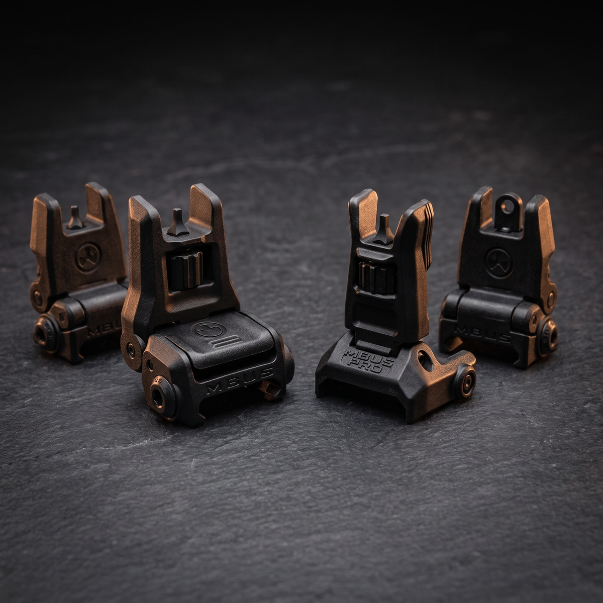 Magpul MBUS 3 and MBUS Pro flip-up backup sights side by side, accompanying our MBUS 3 versus MBUS Pro comparison