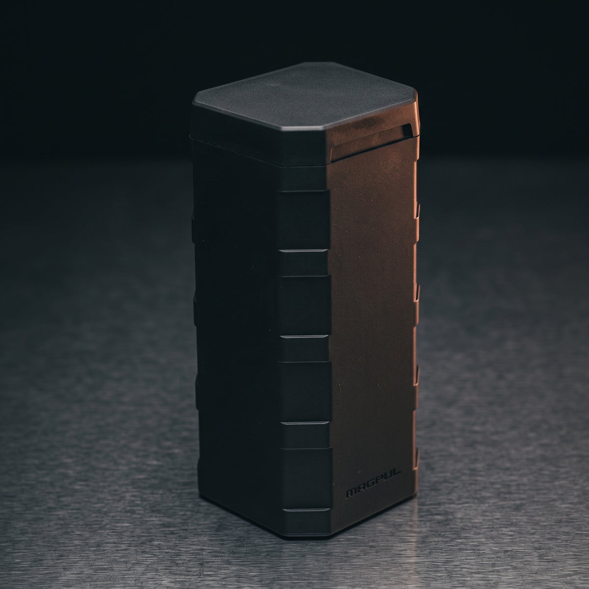 Gun Cases & Storage – Magpul DAKA Can 2.0 storage case on a dark steel surface