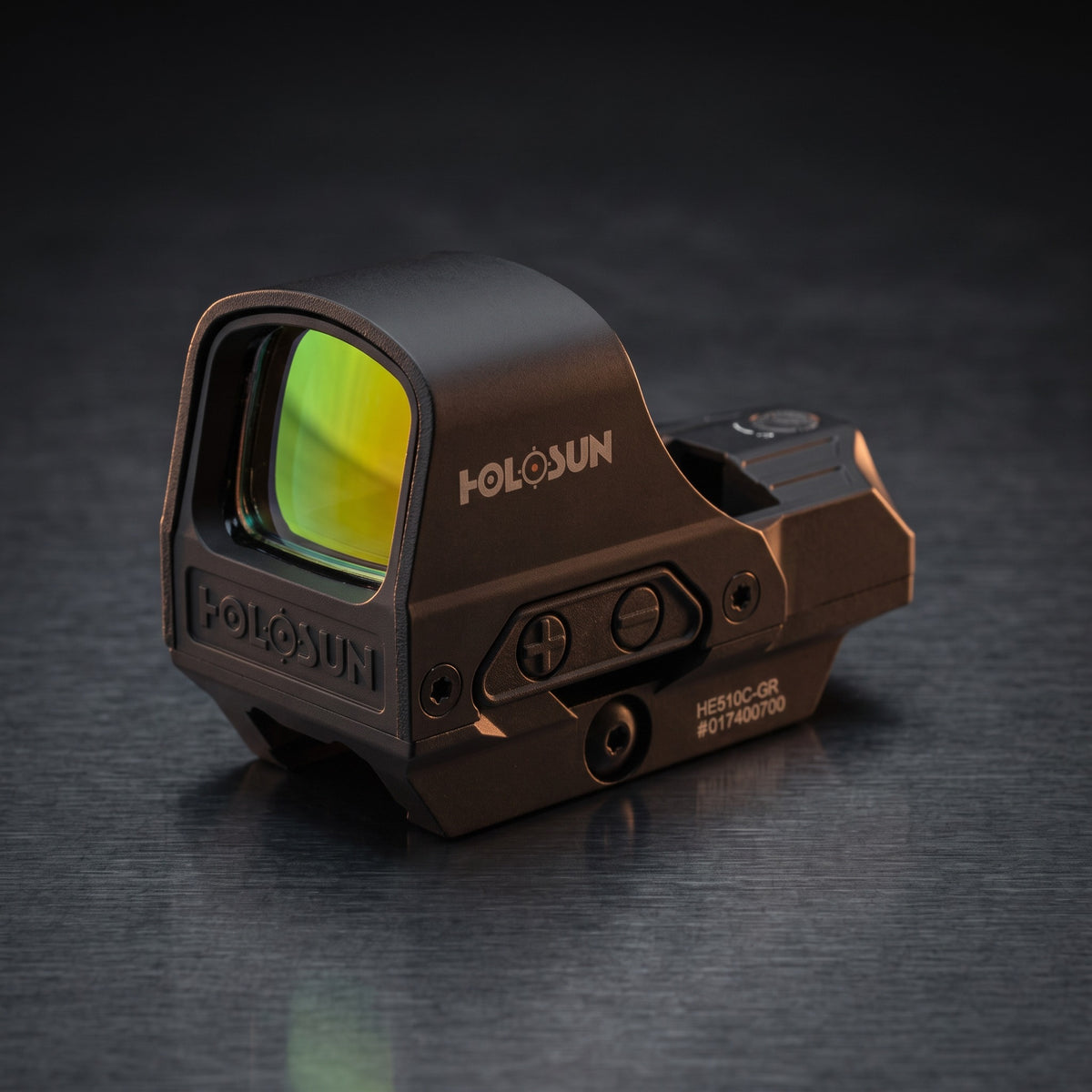 Red Dot Sights – Holosun HE510C reflex sight on a dark steel surface