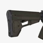 Magpul ACS Carbine Stock Mil-Spec for AR-15/M4, in Olive Drab Green fitted to an AR-15, close-up