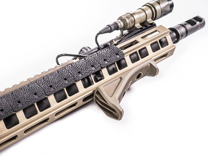 Magpul AFG Angled Fore Grip M-LOK, fitted to an FDE handguard with a weapon light