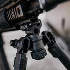 Magpul Bipod for 1913 Picatinny Rail, fitted under a rifle, close-up
