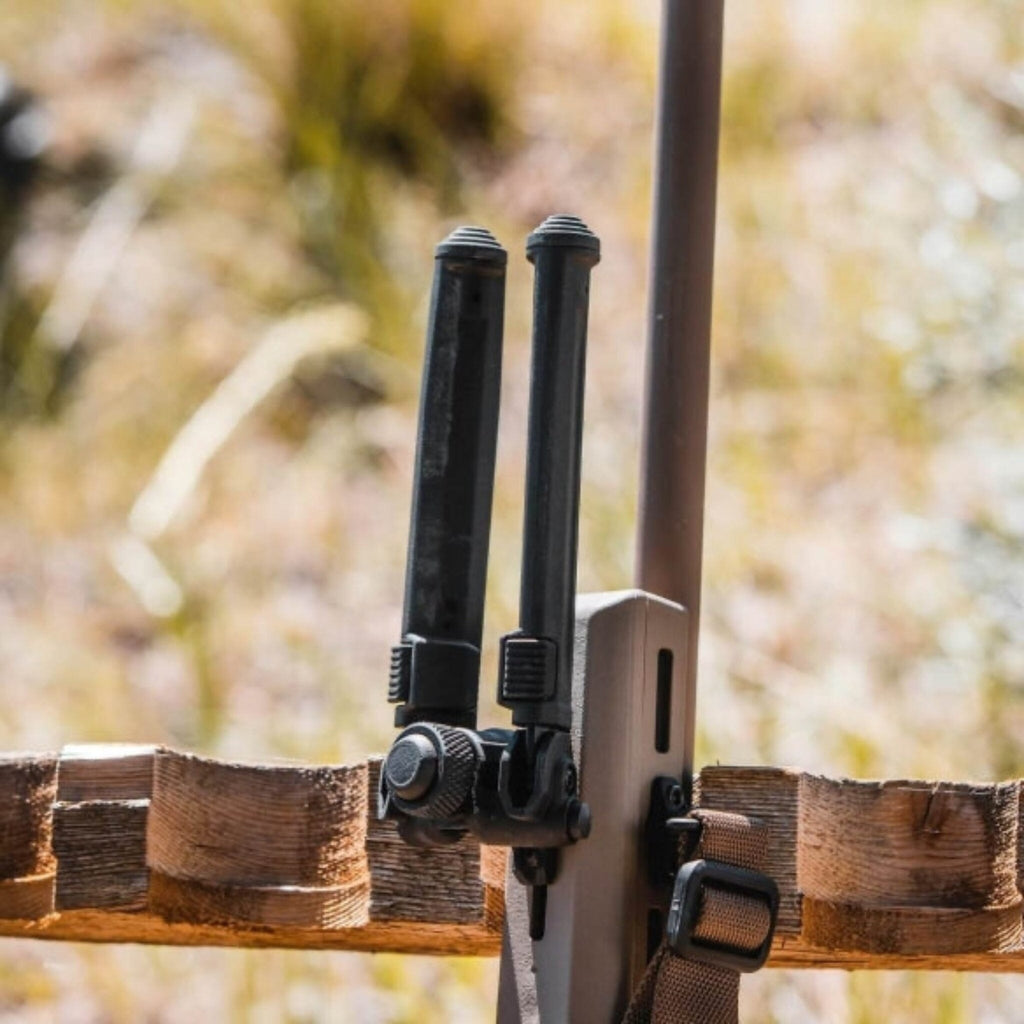 Magpul Bipod for M-LOK, deployed on a rifle outdoors