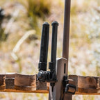 Magpul Bipod for M-LOK, deployed on a rifle outdoors