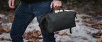 Magpul DAKA Takeout Bag Large, carried by hand outdoors