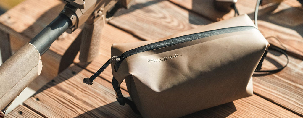 Magpul DAKA Takeout Container, on a wooden deck outdoors