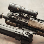 Magpul M-LOK QD Sling Mount, fitted to an M-LOK handguard with a light and sling swivel