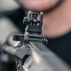 Magpul MBUS 3 Sight Rear for AR-15/M4, deployed on a rifle, shooter's view