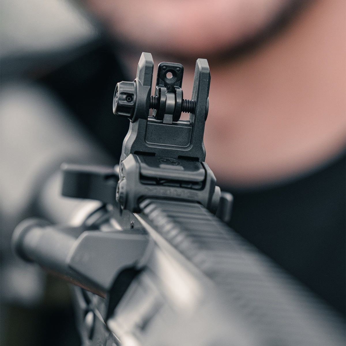 Magpul MBUS 3 Sight Rear for AR-15/M4, deployed on a rifle, shooter's view