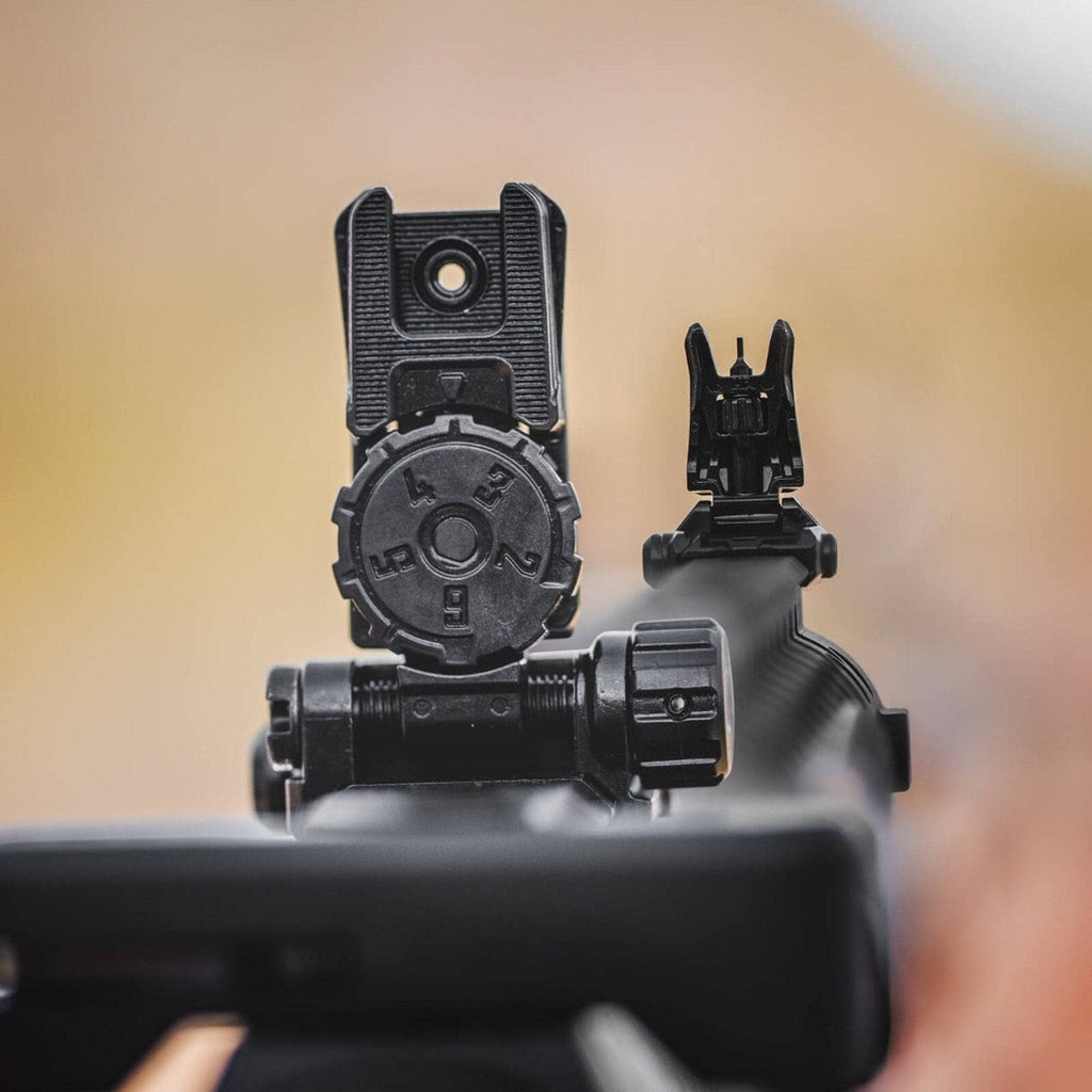 Magpul MBUS Pro LR Adjustable Rear Sight for AR-15/M4, in use behind a rifle with the front sight in view