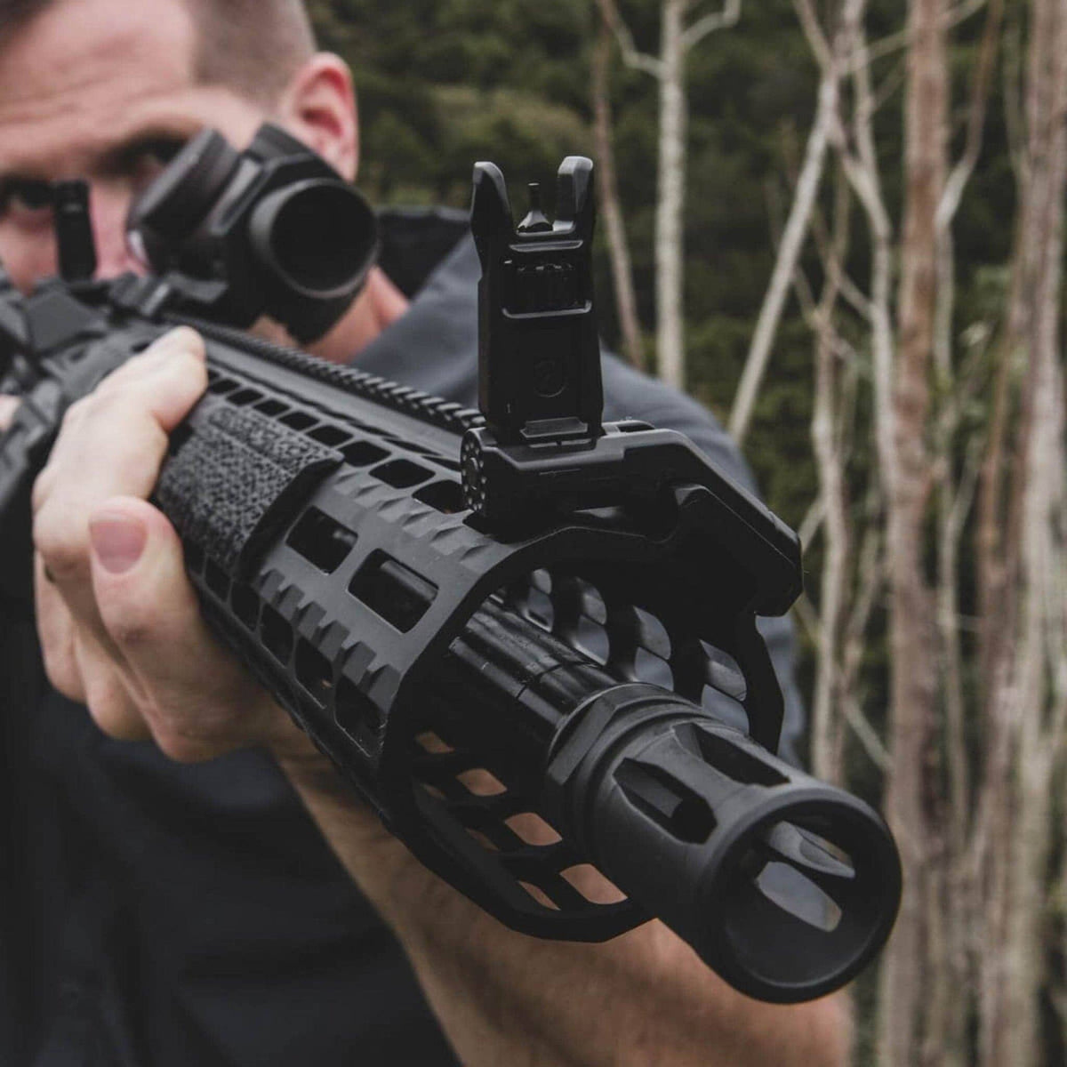Magpul MBUS Pro Offset Front Sight, in use by a shooter aiming a rifle