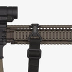 Magpul RSA Rail Sling Attachment, fitted to a quad rail with a sling, side view