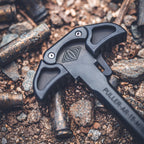 Reptilia PULLER charging handle for AR-15, lifestyle shot on spent brass cases
